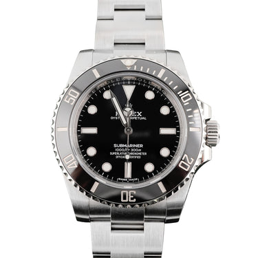 Rolex Submariner 40 mm watch with Black Ceramic Bezel, Black Dial, and Oyster Bracelet on a white background