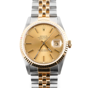 Two-tone Rolex Datejust 36 mm watch with a Fluted Bezel, Champagne Index Dial, and Jubilee Bracelet on a white background