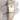 Close-up of a two-tone gold and silver Rolex watch band on a white background