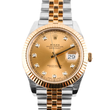 Luxury watch with gold and silver band on a white background