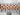 Close-up of a Rolex bracelet with rose gold and silver tones.
