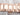 Rolex 336935 Sky-Dweller 42 mm 18K Rose Gold Chocolate Dial Oyster Bracelet Box and Papers 2024 on a textured gray background