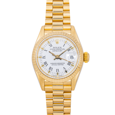 Gold watch with a white face on a white background
