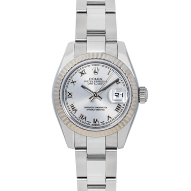 Silver Rolex watch with white face and date display on a white background