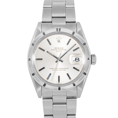 Silver wristwatch with a white face on a white background