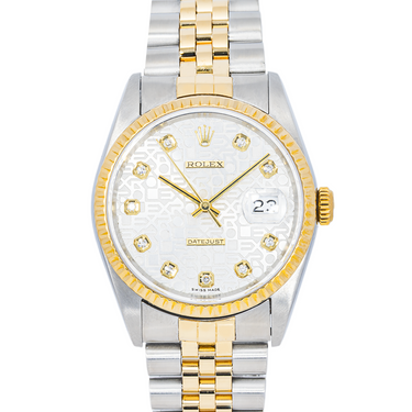 Two-tone silver and gold watch with a white face on a white background
