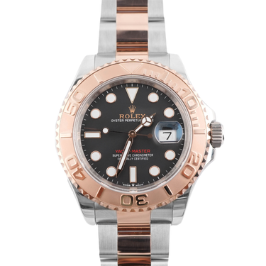 Luxury watch with rose gold and silver band on white background