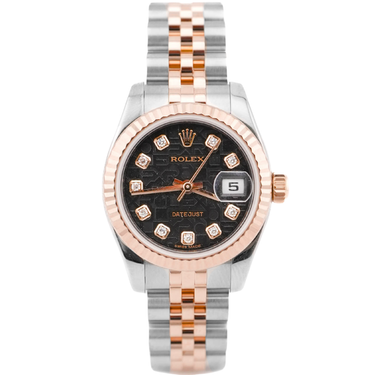 Rolex watch with black dial and rose gold accents on a white background