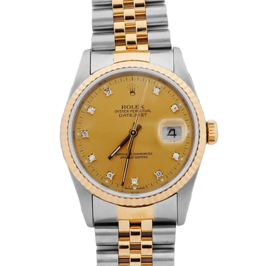Two-tone gold and silver Rolex watch with a gold face on a white background