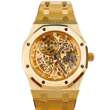 Gold wristwatch with visible mechanical components on a white background