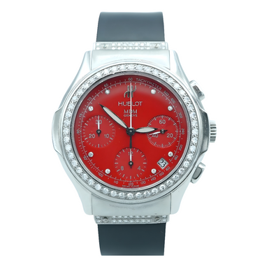 Luxury watch with red face and silver case on a white background