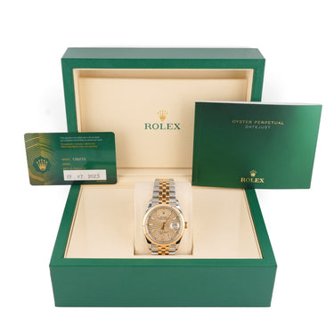 Rolex watch in a green box with a white background