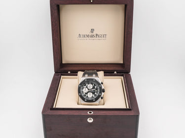 Audemars Piguet watch in a wooden box on a white background