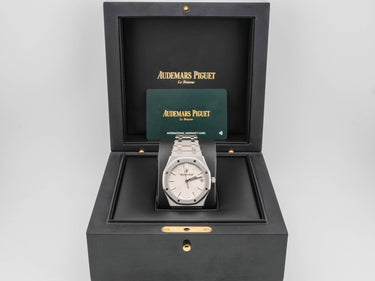 Audemars Piguet watch in a black display box on a light gray background