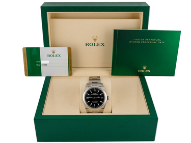 Rolex 114300 Oyster Perpetual 39 mm Smooth Bezel Black Dial Oyster Bracelet Box and Papers 2018