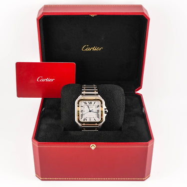 Cartier watch in a red box with a Cartier card on a white background