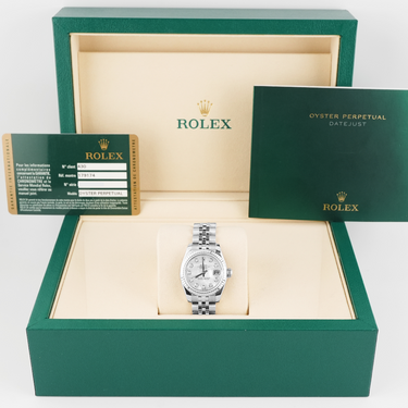 Rolex watch in a green box with branding