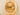 Gold Rolex watch with diamond-studded face on a beige background