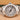 Rolex 76080 Oyster Perpetual Lady 24 mm White Roman Dial Oyster Bracelet Box and Papers 1999 on a beige surface