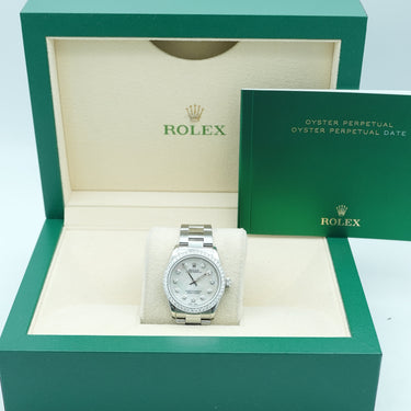Rolex watch in a green box on a light blue background