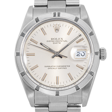 Silver Rolex watch with a white face on a white background
