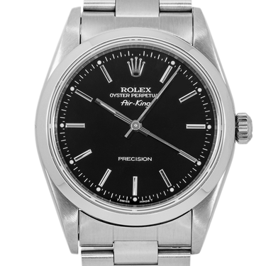 Silver Rolex watch with black dial on a white background