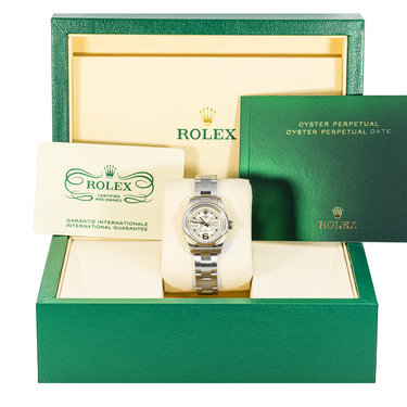 Rolex watch in a green box with a white interior