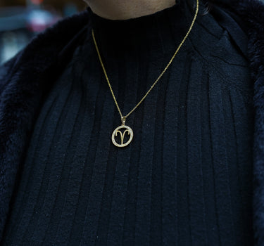 Elegant 14K Gold Aries Zodiac Diamond Pendant - 0.65 Ctw on model wearing black
