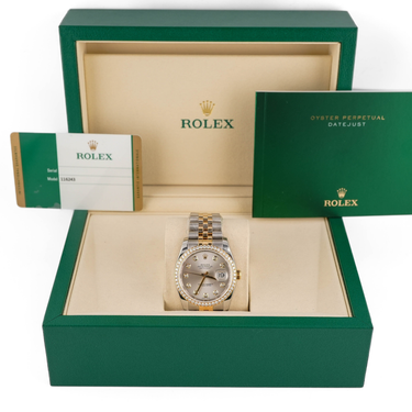 Rolex watch in a green box with a white background