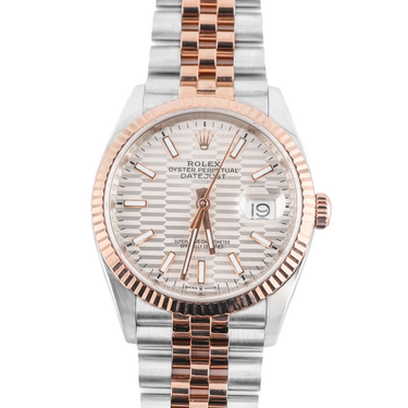 Two-tone Rolex watch with silver and rose gold band on a white background