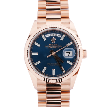 Rose gold watch Rolex 128235 Day-Date 36 mm 18K Rose Gold Blue Dial President Bracelet Box and Papers 2026 on a white background