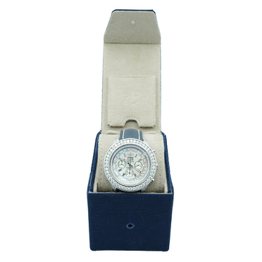 Watch with a blue strap in a navy blue and beige box on a white background