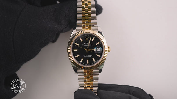 Two-tone Rolex watch with gold and silver band on a white background
