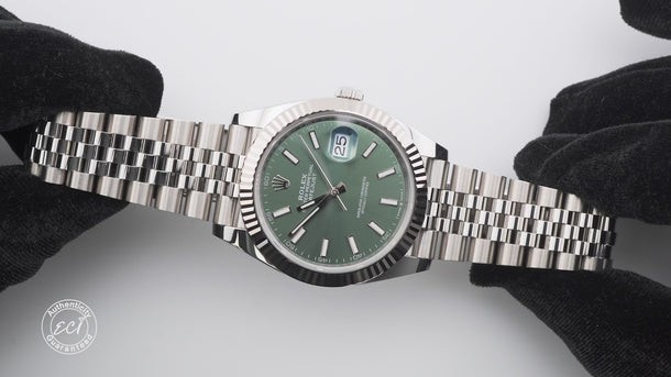Silver Rolex 126334 Datejust 41mm watch with a Mint Green Dial and Jubilee Bracelet on a white background