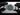silver watch with a blue face on a white background